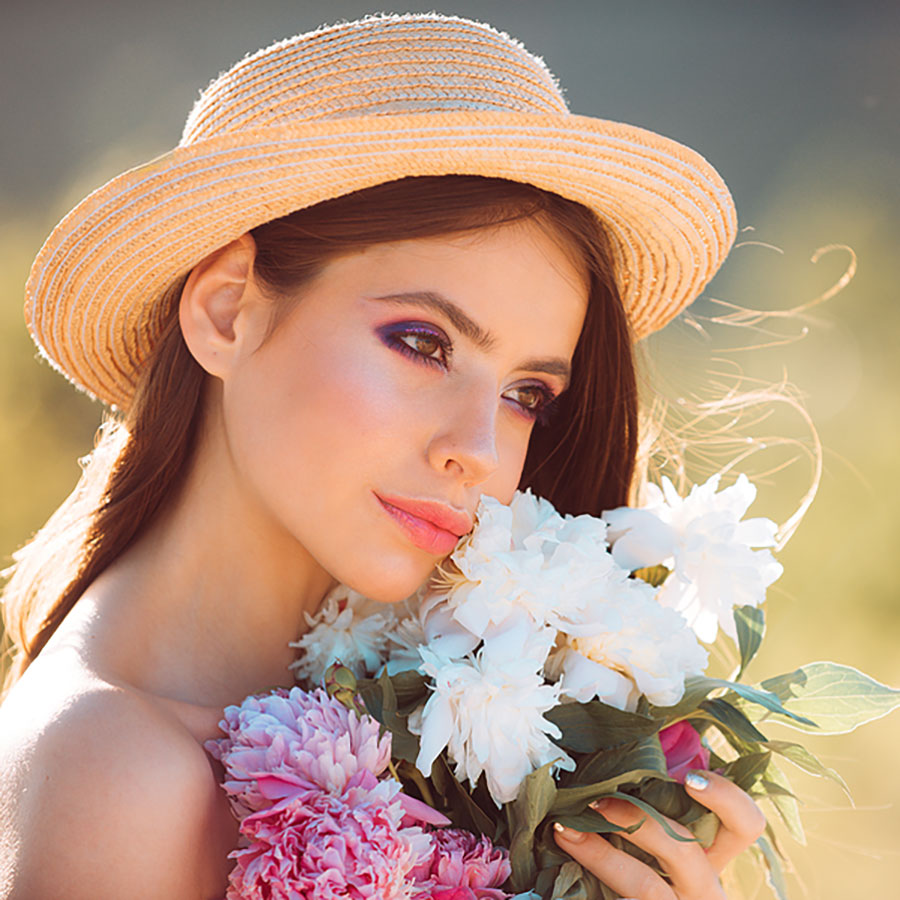Beautiful woman with Spring flowers